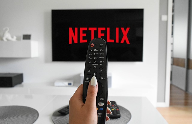 IPTV Smarters Pro streaming live TV on a smart TV with a remote